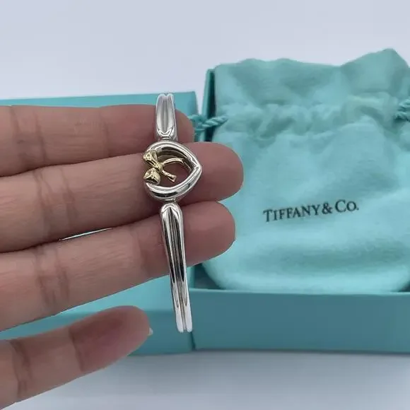 Tiffany & Co Sterling Silver and 18K Yellow Gold Heart Bow Ribbon Cuff Bracelet